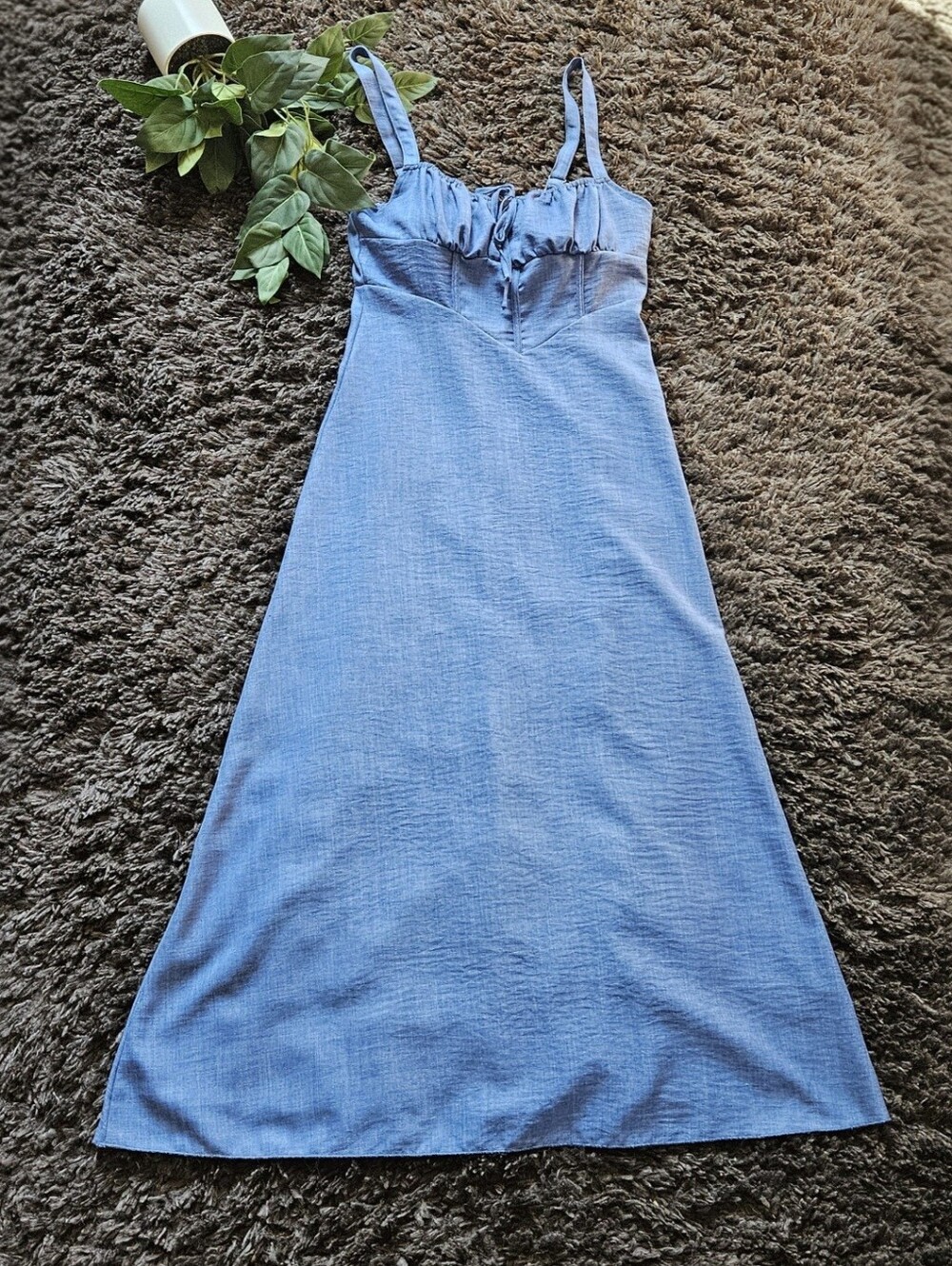 Steel blue hue midi dress. Fitted bodice transitioning to a flowing A-line skirt